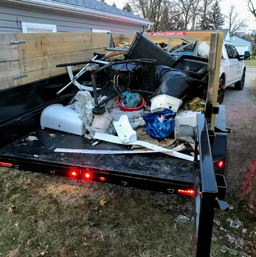 Roll-off dumpster delivered to a residential driveway in Tonganoxie